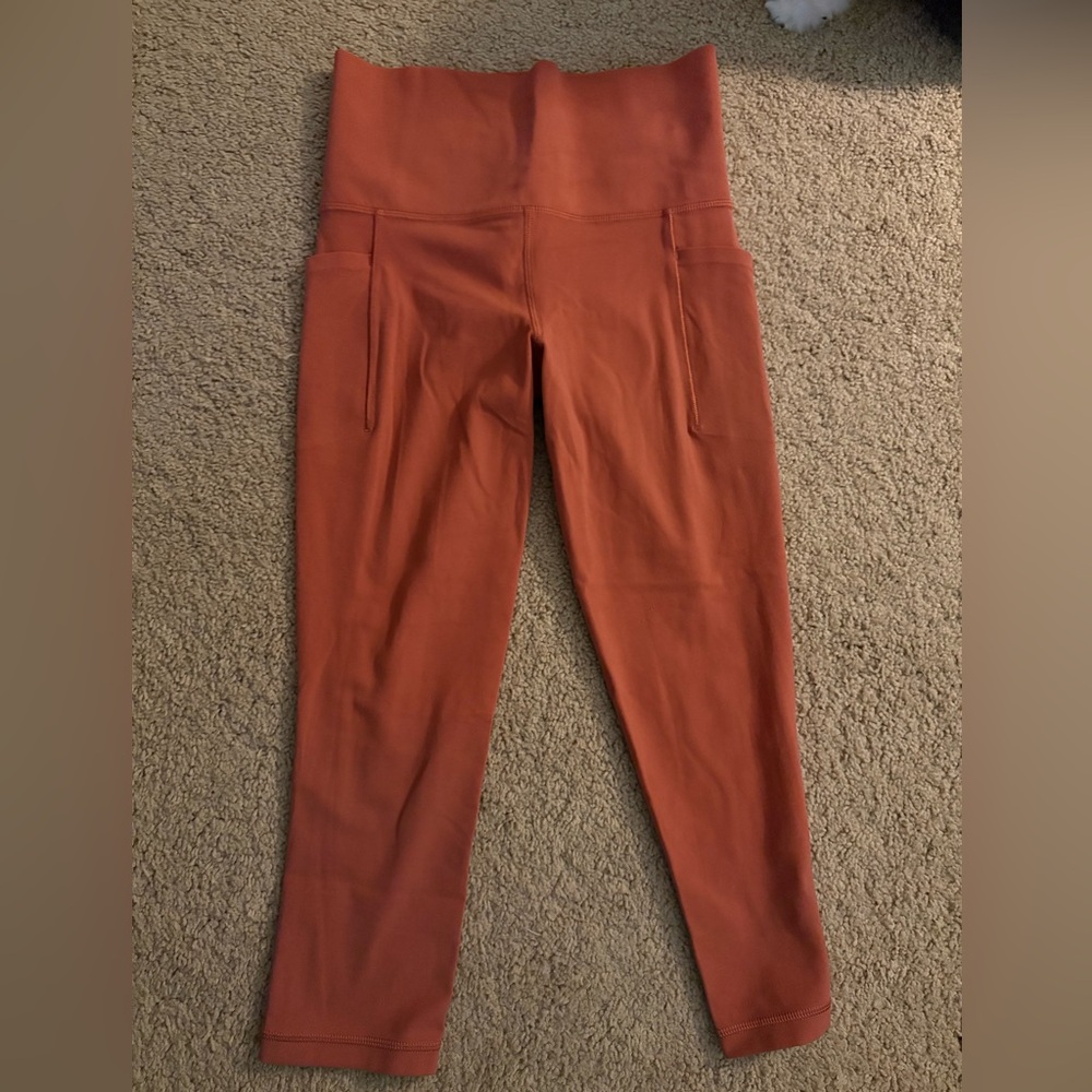 Athleta salutation stash pocket tight